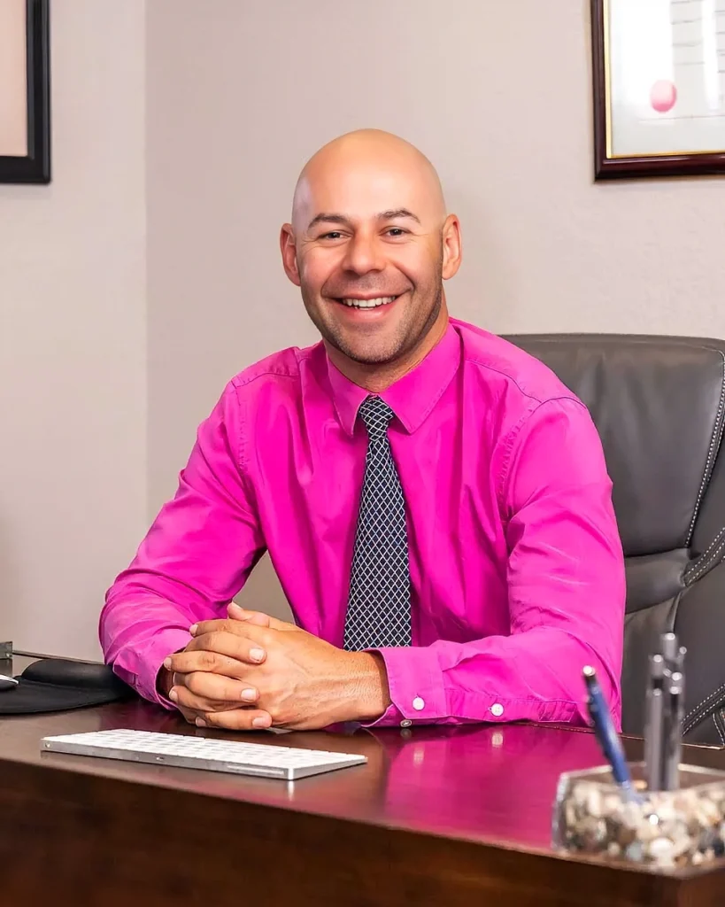 Richard Rahnema in a professional office setting